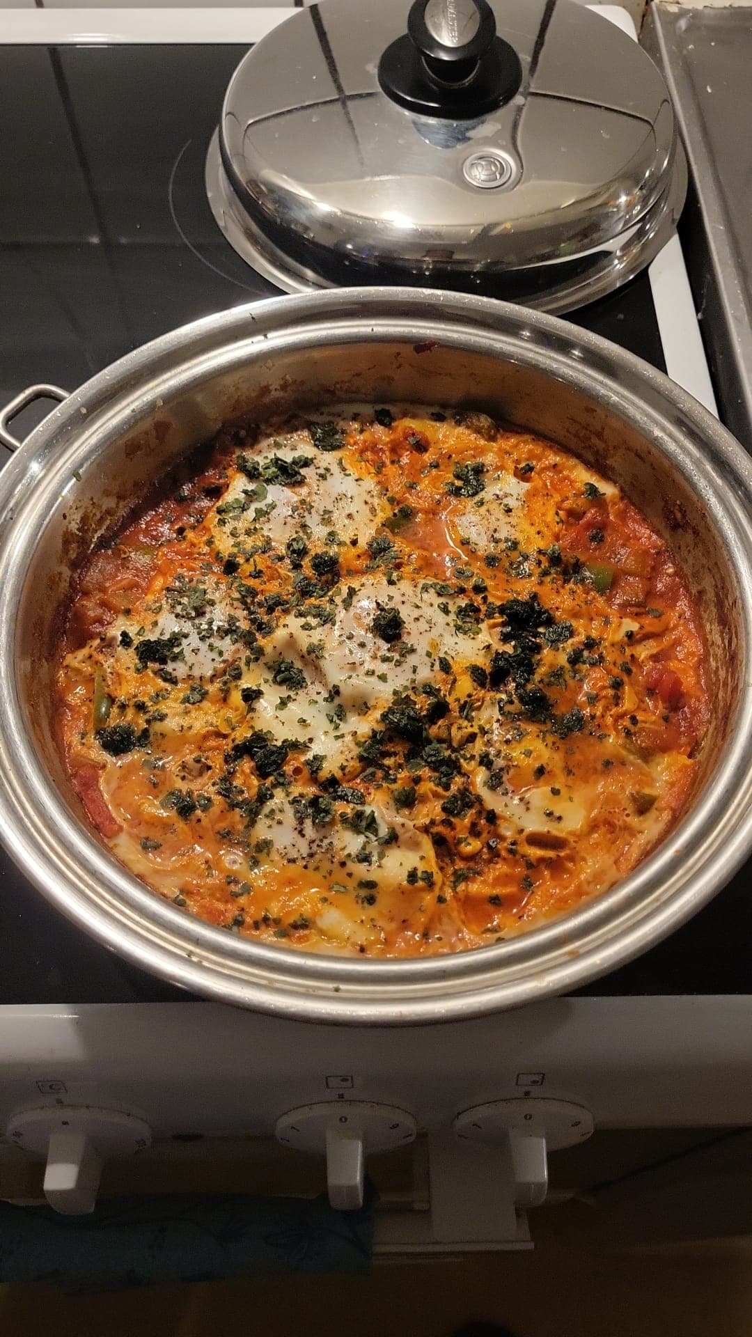 Shakshouka simmering in a Saladmaster pan